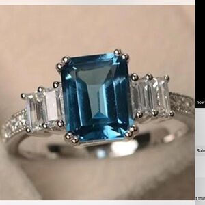 light #londonbluetopaz blue ring with #baguette stone setting #emeraldcut